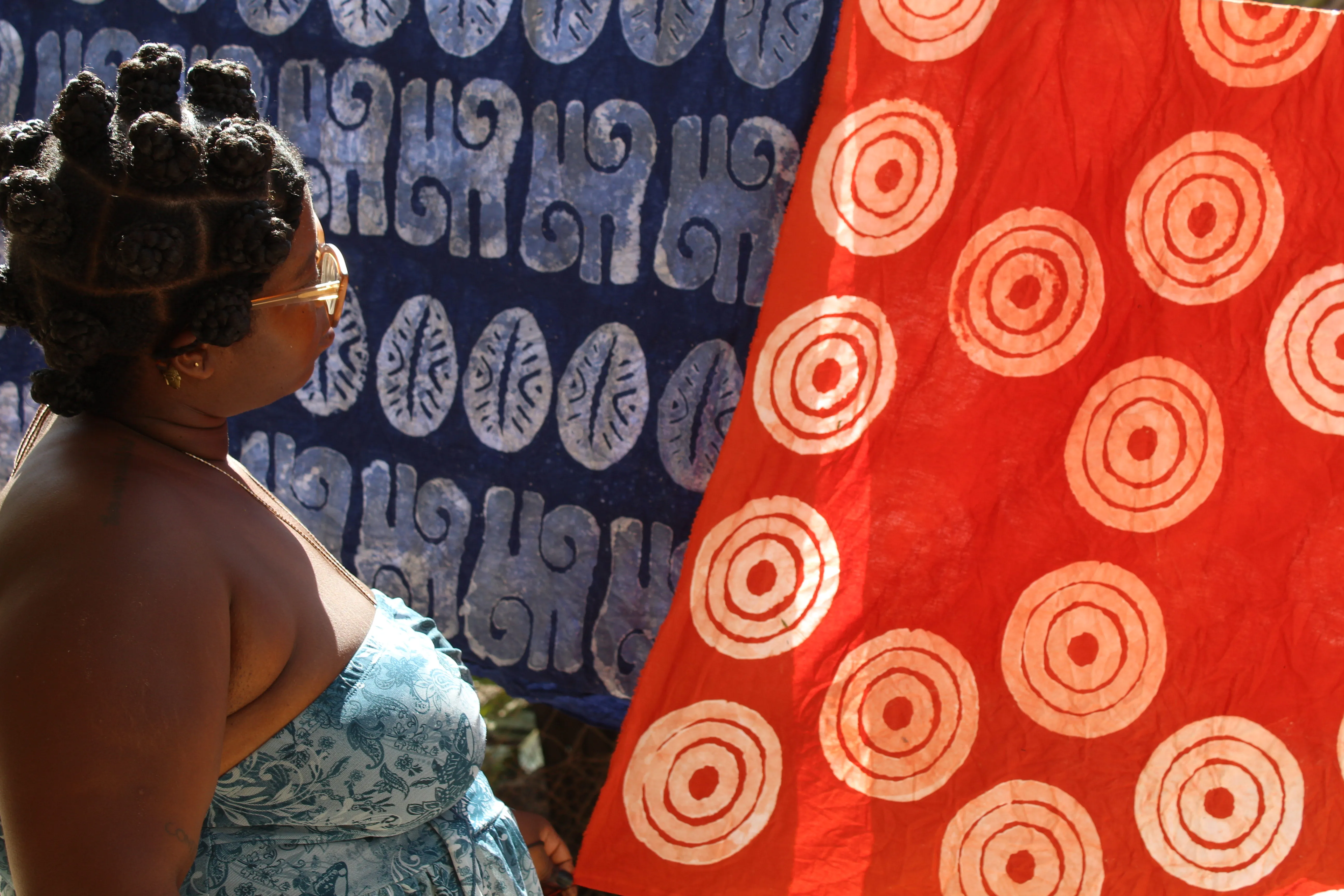 Red and blue patterned batik cloth close up